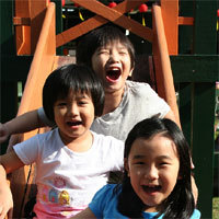 Pole pad kids laughing_home page